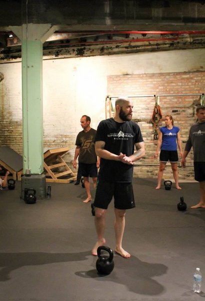 Andrew Keller Leading Kettlebell Class