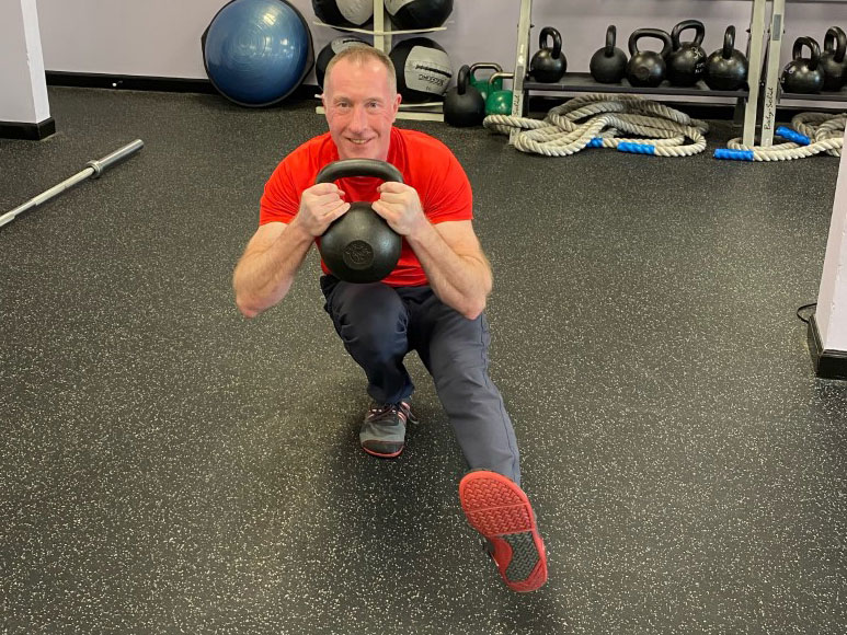 Brian McMaster, RKC Team leader performs a Kettlebell Pistol