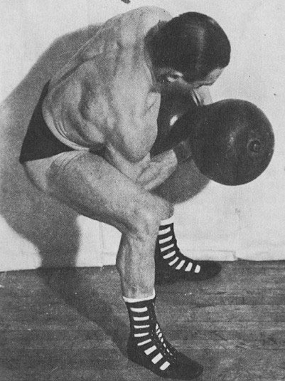 Classic Image Athlete Performing A Klein Curl