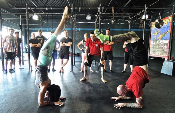 Freda Mooncotch and Al Kavadlo demonstrate scorpion at the PCC