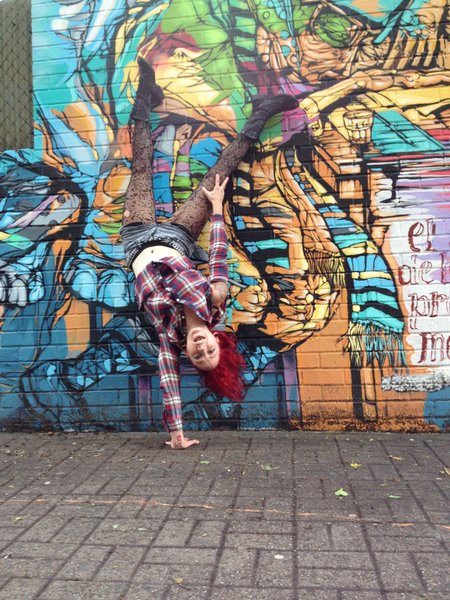 PCC Instructor, Grace Menendez one Arm Handstand