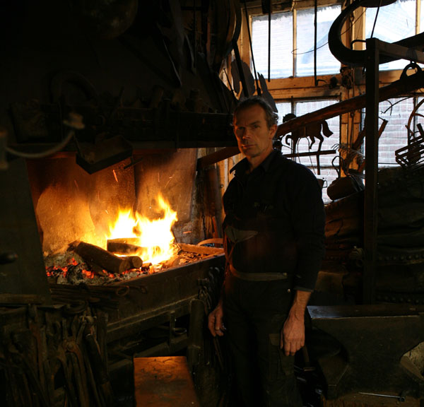 Henk van den Bergh with his forge