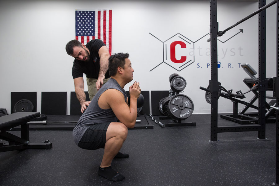 Jason Kapnick Coaching Goblet Squat at Catalyst SPORT