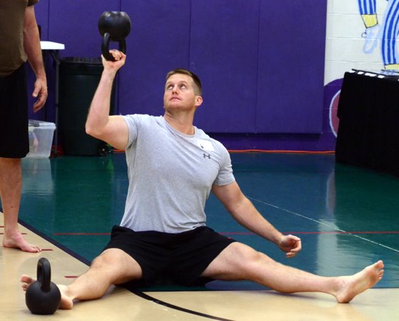 Luke Tipple Bottoms Up Kettlebell Press In Seated Straddle