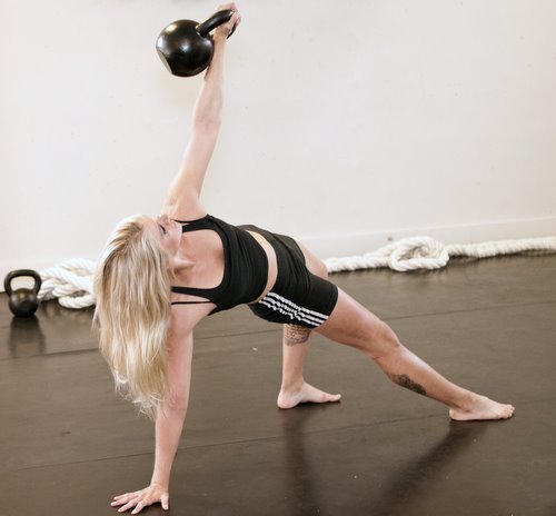 Malin Kirjonen Performing a Kettlebell Get-Up