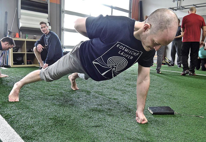 Nick Collias One Arm Pushup Fist PCC