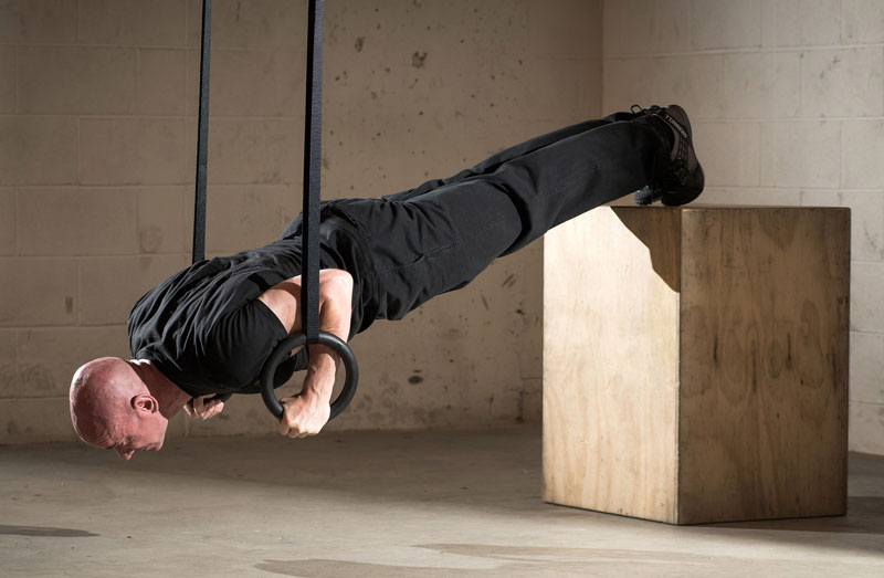 Push Up With Gymnastic Rings Stock Photo, Picture and Royalty Free Image.  Image 91704868.