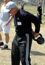 Mike Burgener, Notre Dame Football player, Champion weightlifter and head coach Junior Women's Weightlifting team practices with a Russian Kettlebell