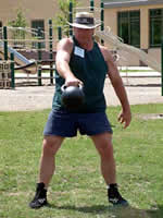 Olympic Medalist and Chiropractor Dennis Koslowski practices swings with Russian Kettlebells