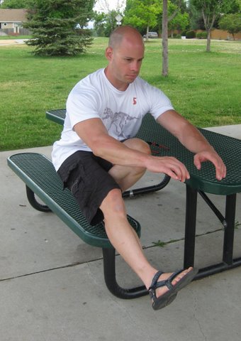 PCC Instructor Matt Schifferle demonstrates a pistol aka one leg squat