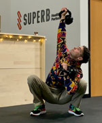 Nick Lynch double Kettlebell Overhead Squat thumbnail